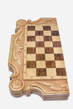 Detail of the bronze-topped chess pieces standing on the inlaid squares