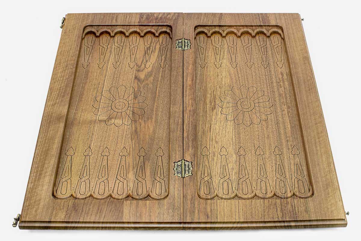 Royal carving on a 13 kg solid walnut chess set - side view