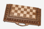 Figural bronze chess pieces on the luxurious walnut board - detail