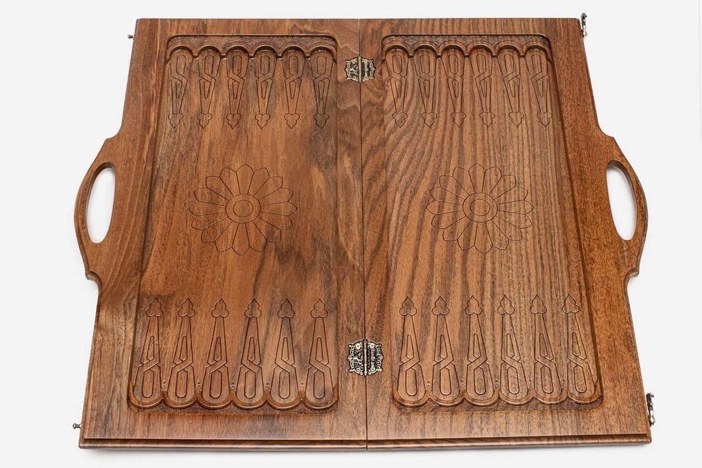 Ornate walnut chess and backgammon set folded with bronze hinges and clasps