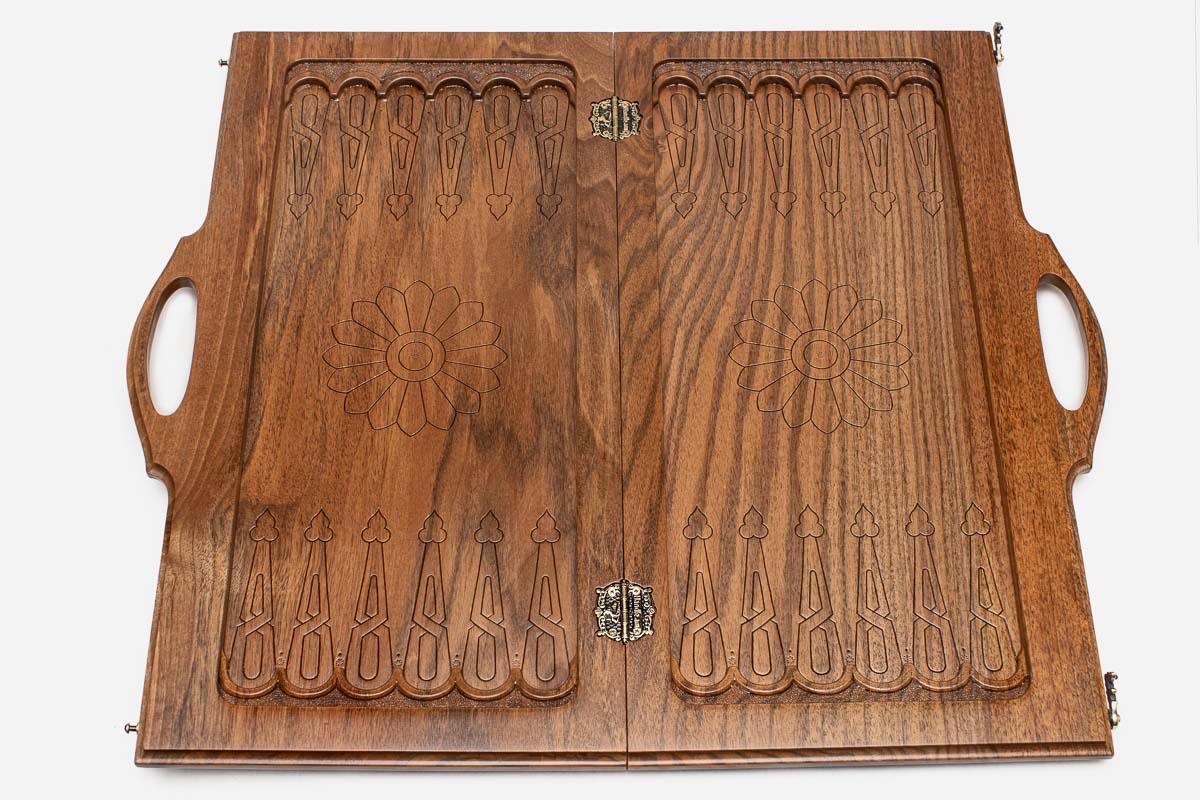 Ornate walnut chess and backgammon set folded with bronze hinges and clasps