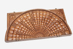 Angled view of the space master carved walnut backgammon board
