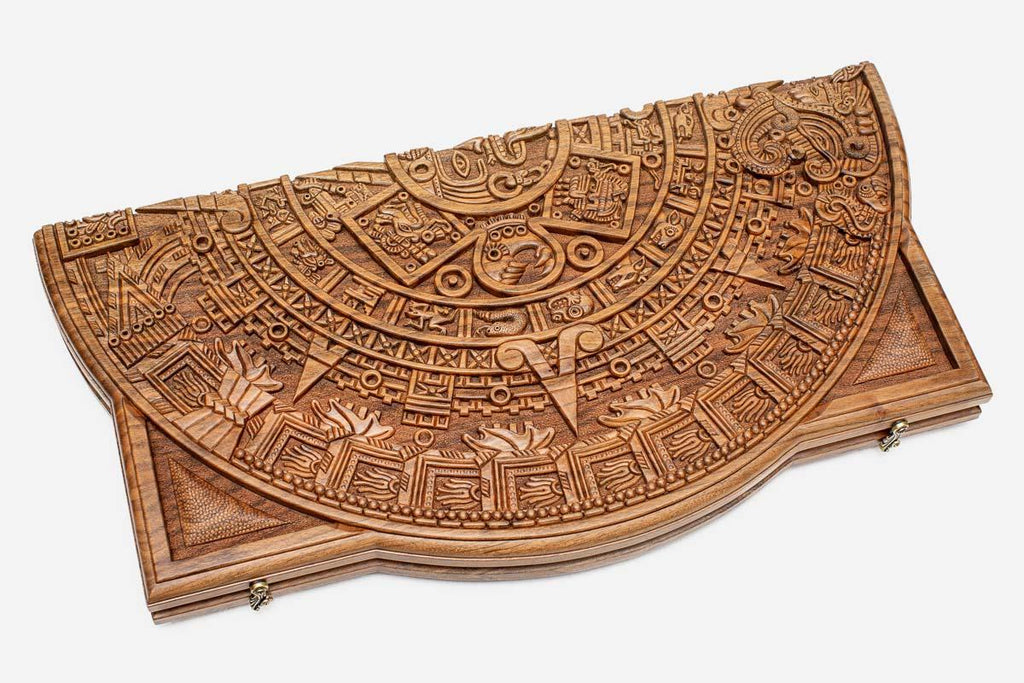 Angled view of the Maya calendar master carved walnut backgammon board