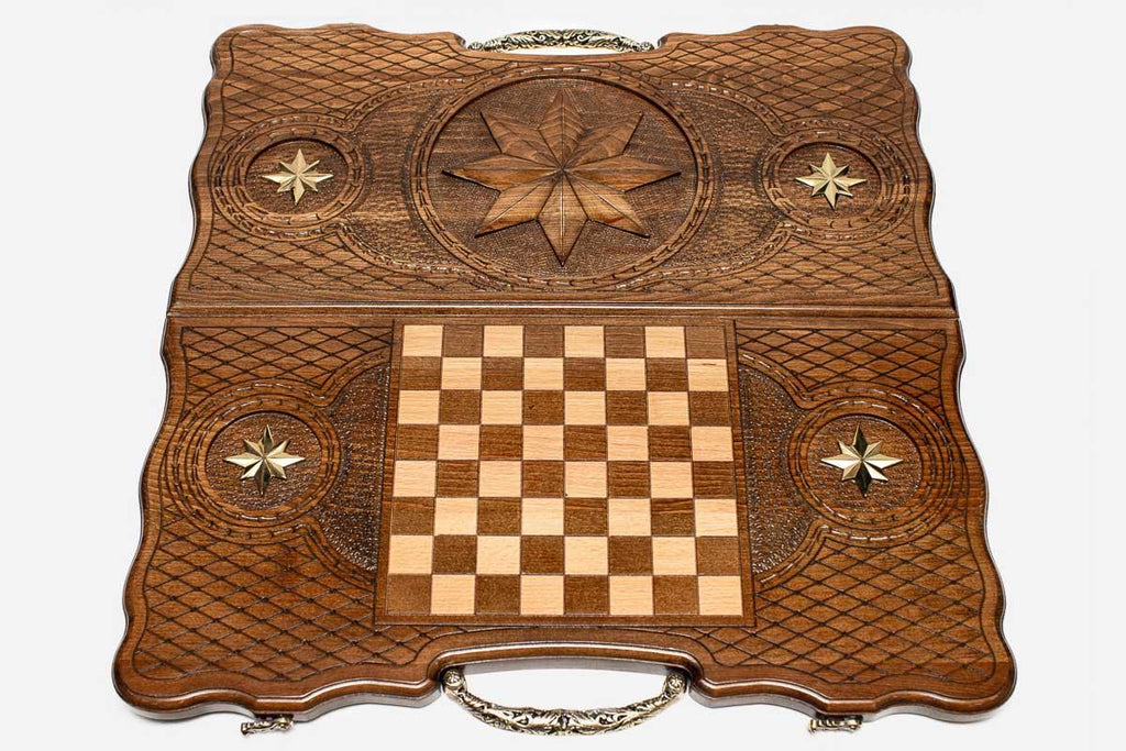 The backgammon board opened to show the wooden playing surface