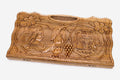 Carved walnut backgammon board with two carved scenes and a carry handle, propped open