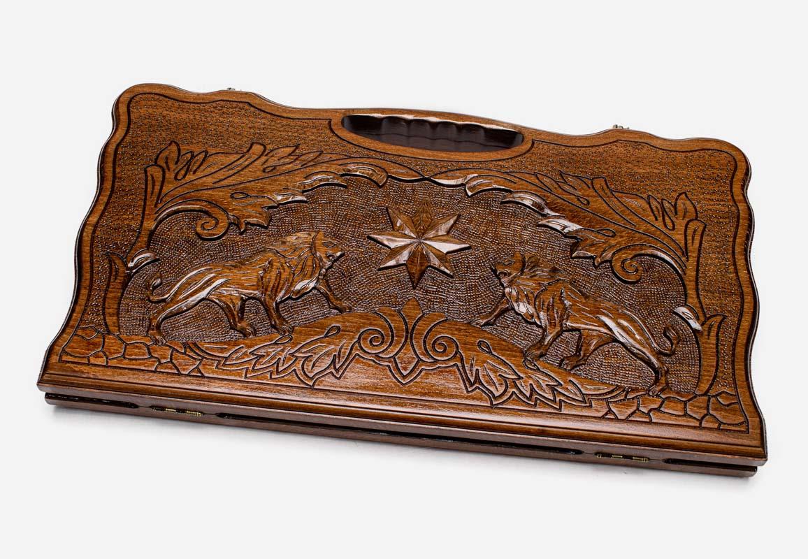 Carved beechwood backgammon board with two lions and an octagon ornament, propped open