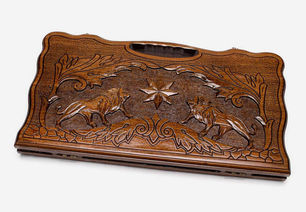 Carved beechwood backgammon board with two lions and an octagon ornament, propped open