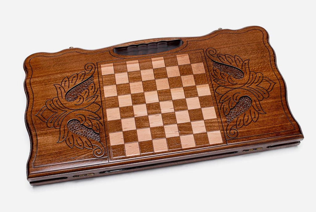 Angled view of the lions and octagon carved backgammon board
