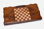 Angled view of the lions and octagon carved backgammon board