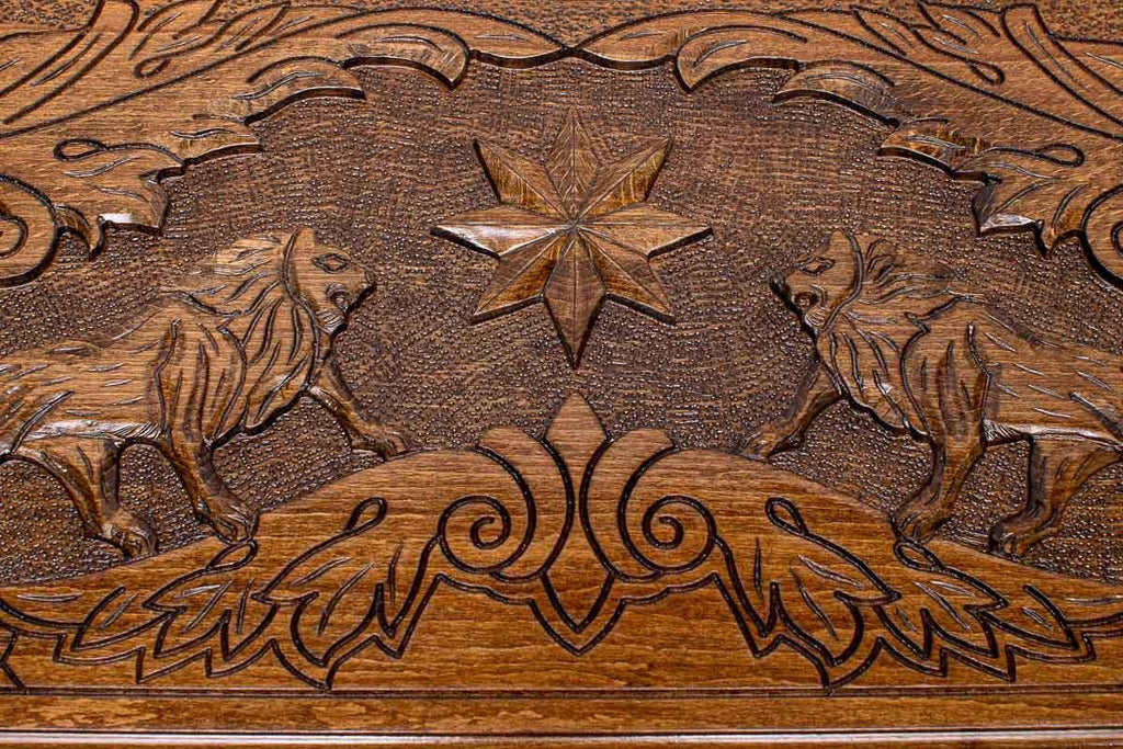 The backgammon board opened to show the wooden playing surface