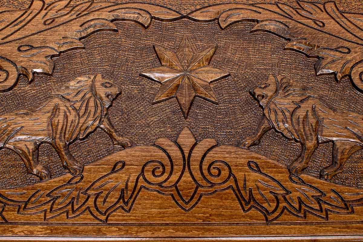 The backgammon board opened to show the wooden playing surface