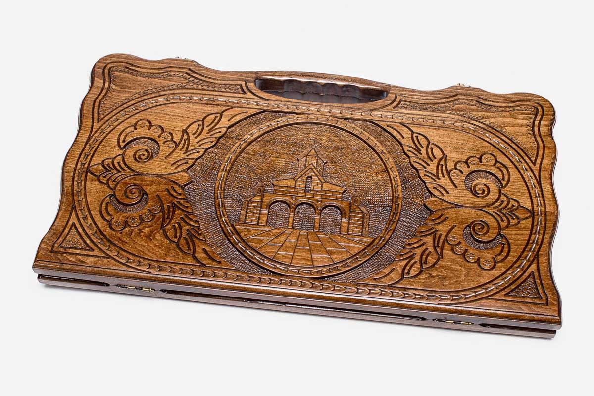 Carved beechwood backgammon board with the Saint Gayane Church and a carry handle, propped open