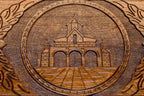The backgammon board opened to show the wooden playing surface