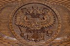 The backgammon board opened to show the wooden playing surface
