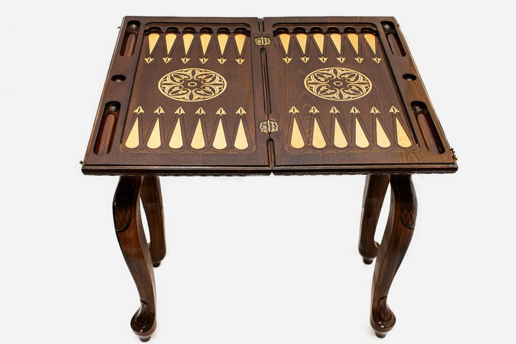 Floral ornament backgammon table opened flat showing the inlaid playing field