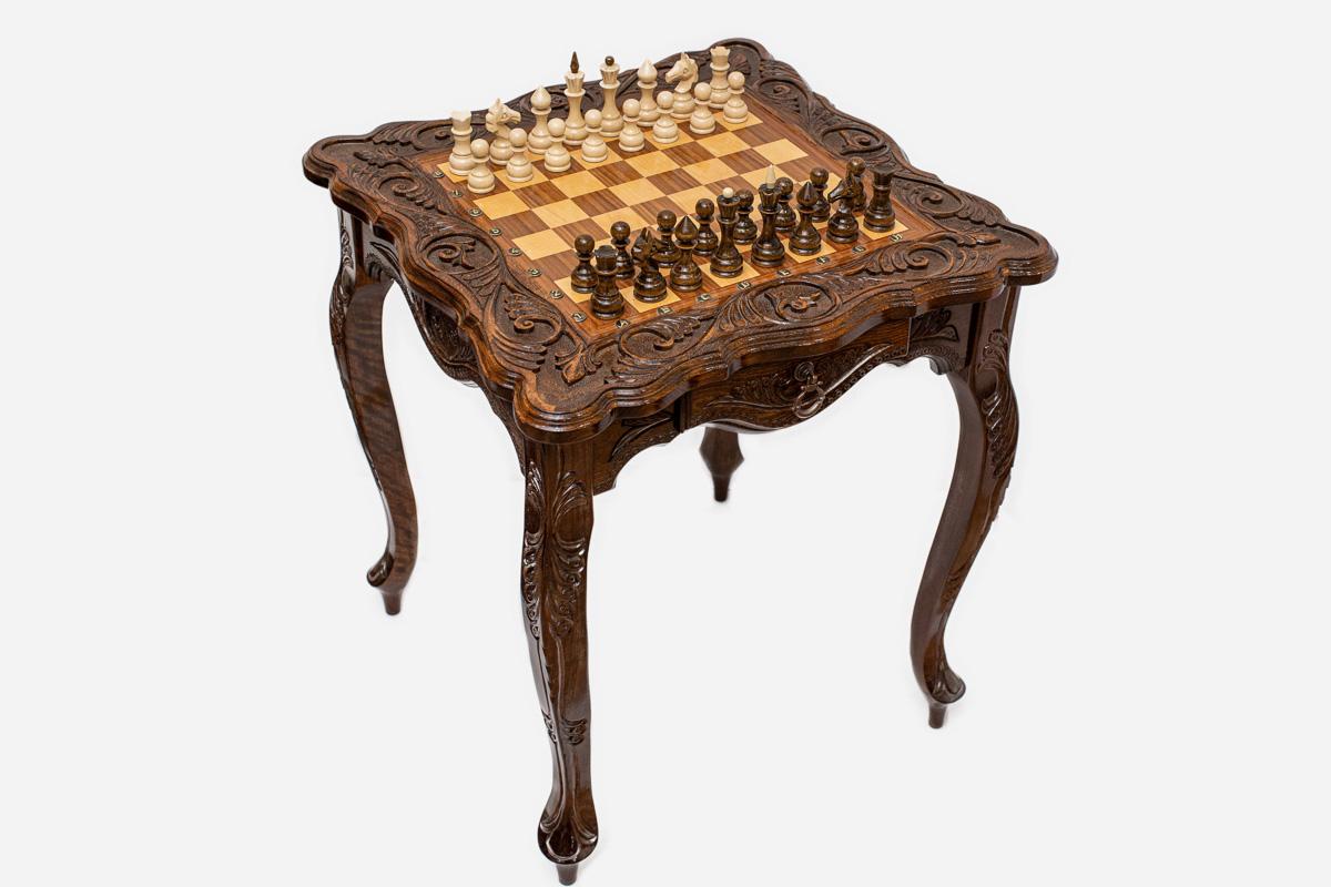 Carved chess table with ornaments, side profile