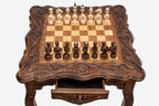 Luxurious chess table with ornaments, wooden pieces and integrated storage