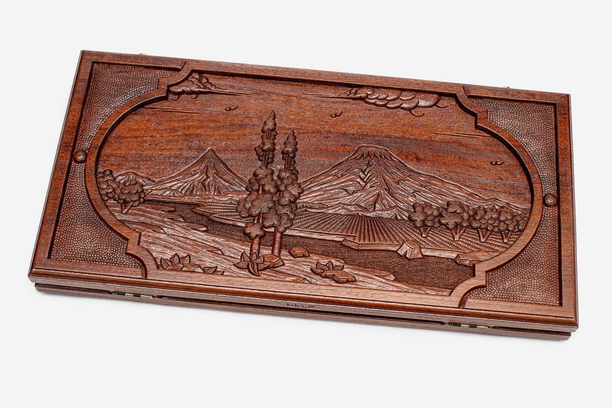 Master-carved oak backgammon board with a landscape of Mount Ararat, propped open
