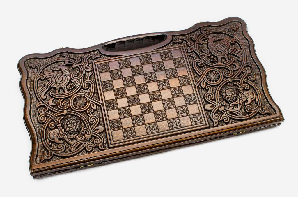 Angled view of the tiger carved backgammon board