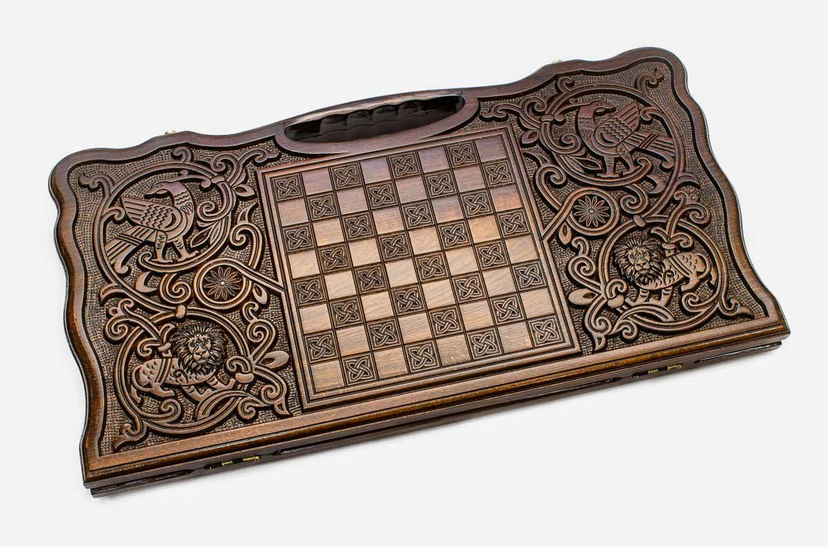 Angled view of the tiger carved backgammon board