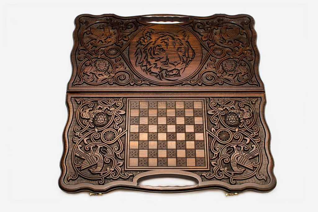 Detail of the scrollwork beside the carved tiger