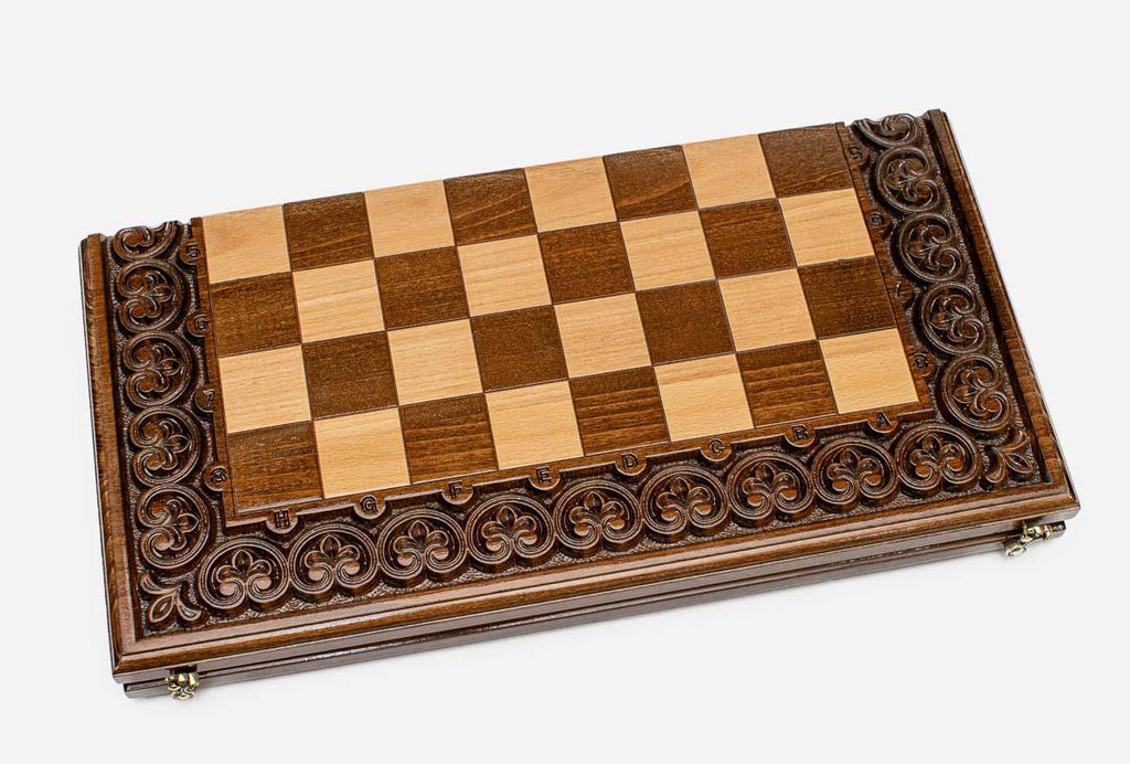 Carved chess set folded with bronze hinges and clasps