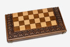 Carved chess set folded with bronze hinges and clasps