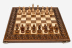 Carved chess set with 32 wooden pieces in beech and walnut
