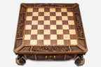Atlant carved chess set empty board, top-down view of the walnut and maple squares