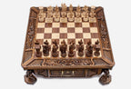 Atlant carved chess set with hand-carved wood pieces set up for play, front view