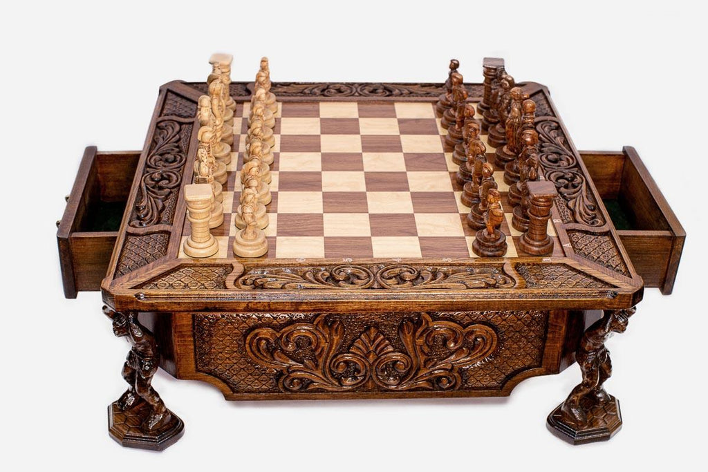 Atlant carved chess set with the two side drawers open, angled view