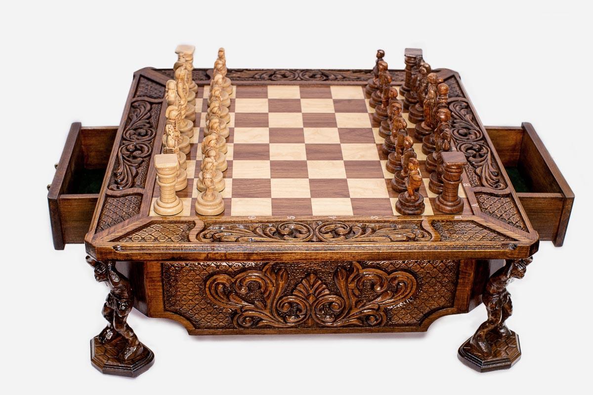 Atlant carved chess set with the two side drawers open, angled view