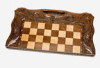 Figural bronze chess pieces on the ornament chess board - detail