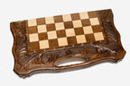 Ornament and bronze chess set folded with bronze hinges and clasps