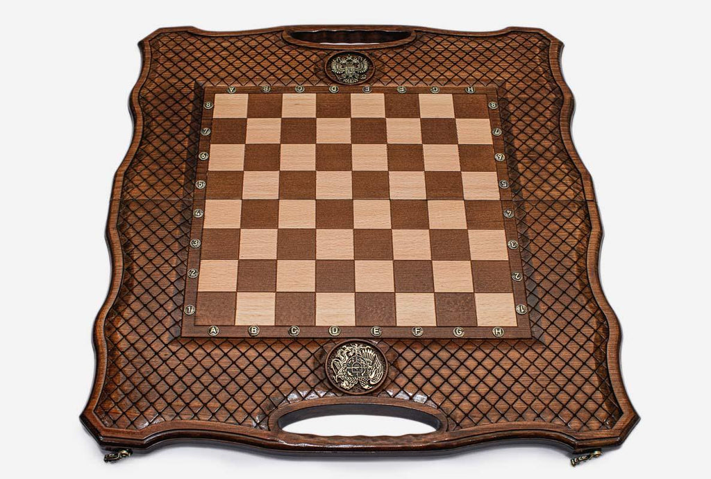 Angled view of the folding chess backgammon set with its faceted wooden pieces