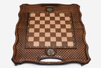 Angled view of the folding chess backgammon set with its faceted wooden pieces