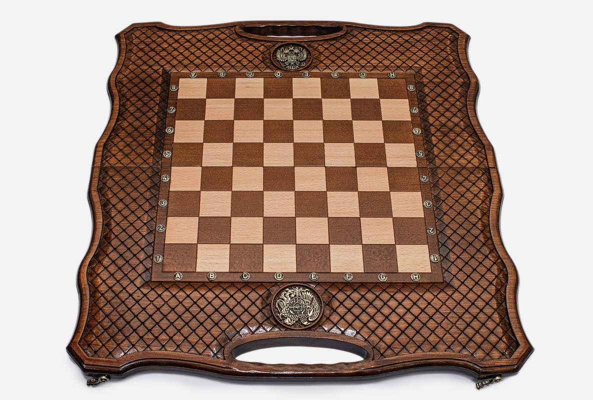 Angled view of the folding chess backgammon set with its faceted wooden pieces