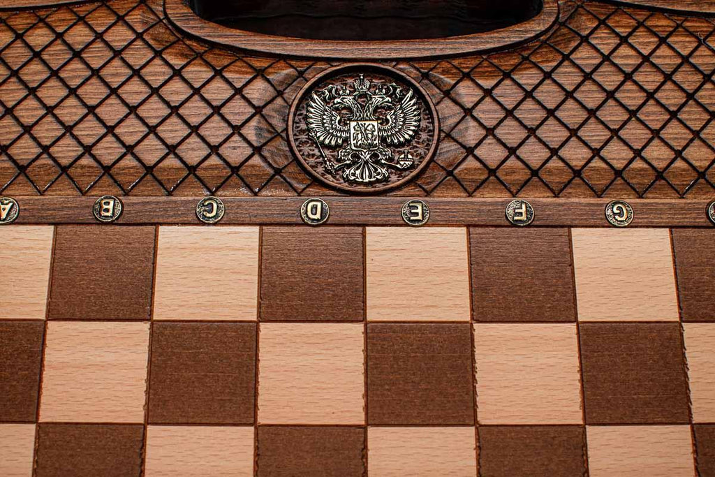 Close-up of the faceted wooden chess pieces on the maple inlaid squares