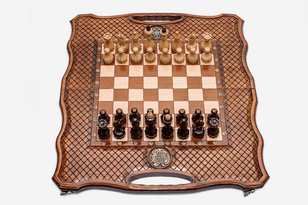 Luxury Russian chess backgammon set with a lattice-carved border, inlaid double-headed eagle and faceted wooden pieces set up for play