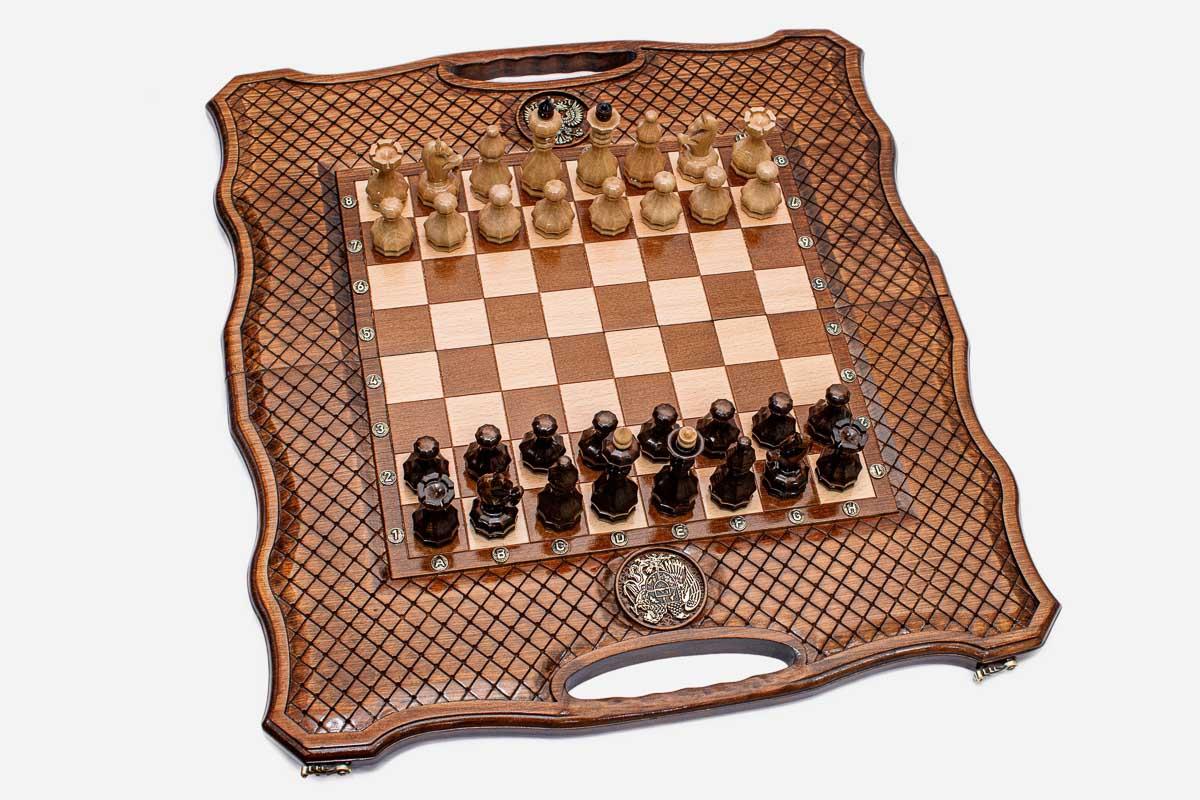 The board opened out to show the backgammon field and its wooden checkers