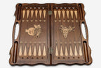 Pomegranate and grapevine hand-carved on a luxury chess board - detail