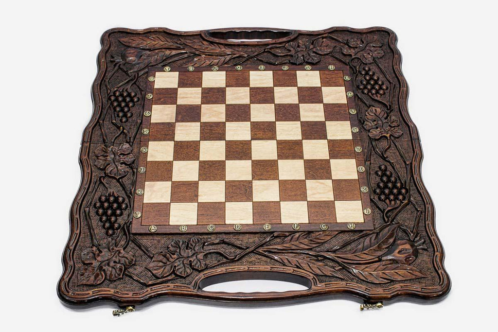 Walnut pomegranate chess set folded with bronze hinges and clasps