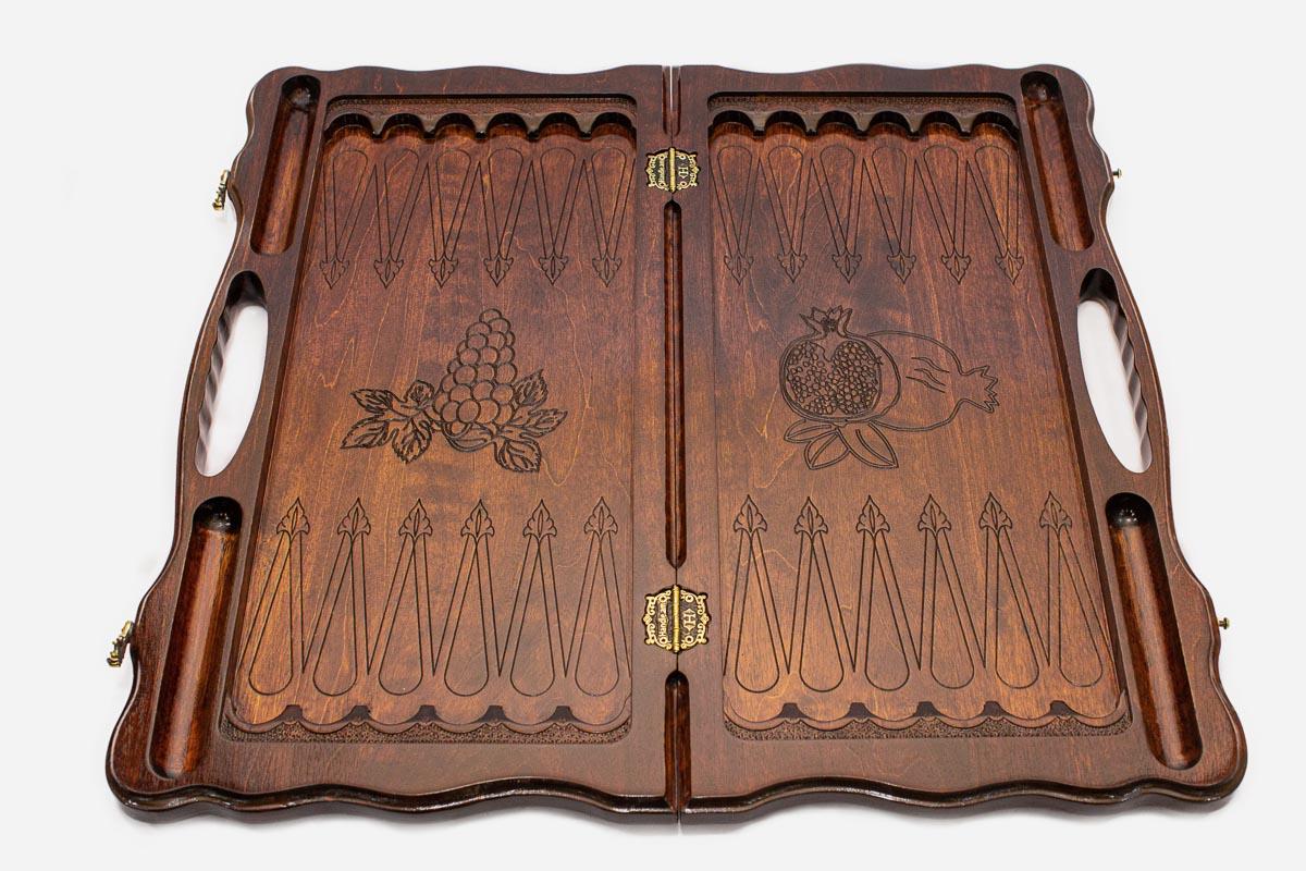 Pomegranate and grapevine hand-carved in dark walnut - chess board detail