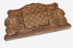 Angled view of the dragon master carved walnut backgammon board