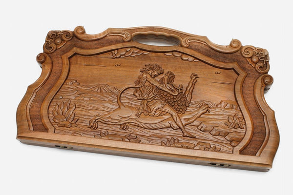 Master-carved walnut backgammon board with Mher tearing the lion's mane, propped open