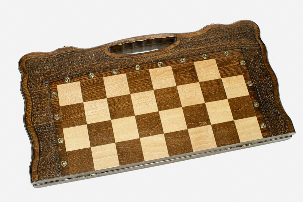Classic chess backgammon set with bronze pieces folded with bronze clasps