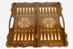 Classic hand-carved border under figural bronze pieces - detail