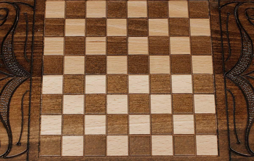 The backgammon board opened to show the wooden playing surface