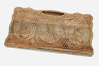 Angled view of the two kings carved walnut backgammon board