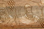 The backgammon board opened to show the wooden playing surface